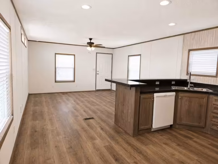 Medallion, Texas, quiet community street view, new manufactured home exteriors, neighborhood
