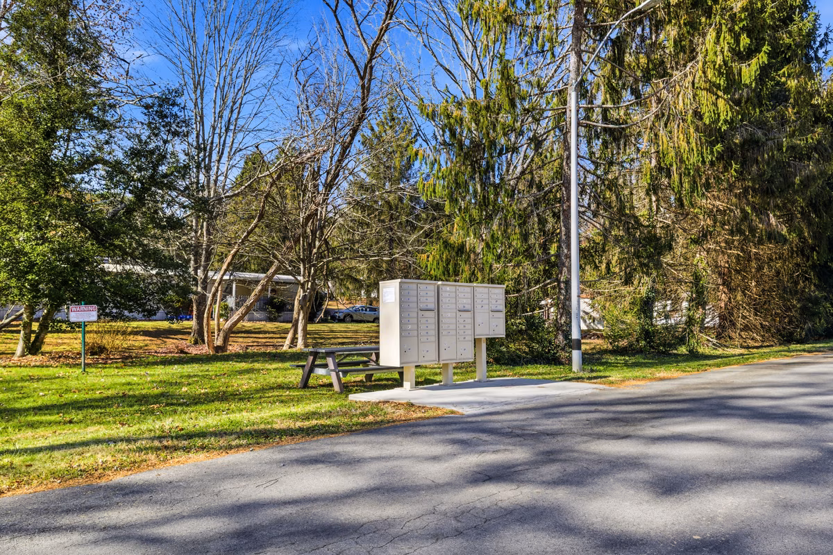 new manufactured home exteriors, Medallion Communities neighborhood, playground, clubhouse, affordable